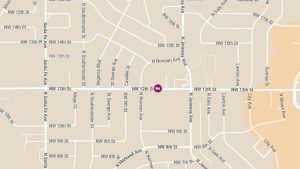 Injury Reported in Crash Involving BMW and Dodge Ram on NW 12th St