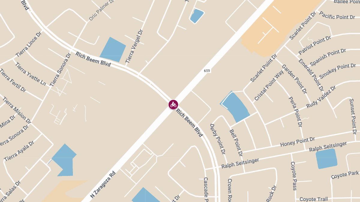 Motorcycle Crash at Zaragoza Rd & Rich Beem Blvd Causes Injuries