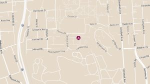 One Injured in Car and Bicycle Crash in Parking Lot near South Fine St