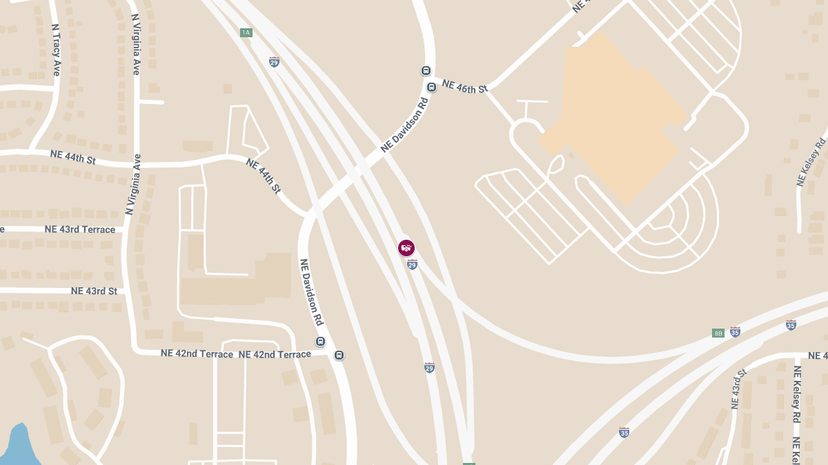 Two Injured in Crash on I-35 at I-29 Involving Lane Change and Off-Road Impacts