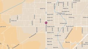 Two-Vehicle Crash with Injuries in Parking Lot Near S Reserve St