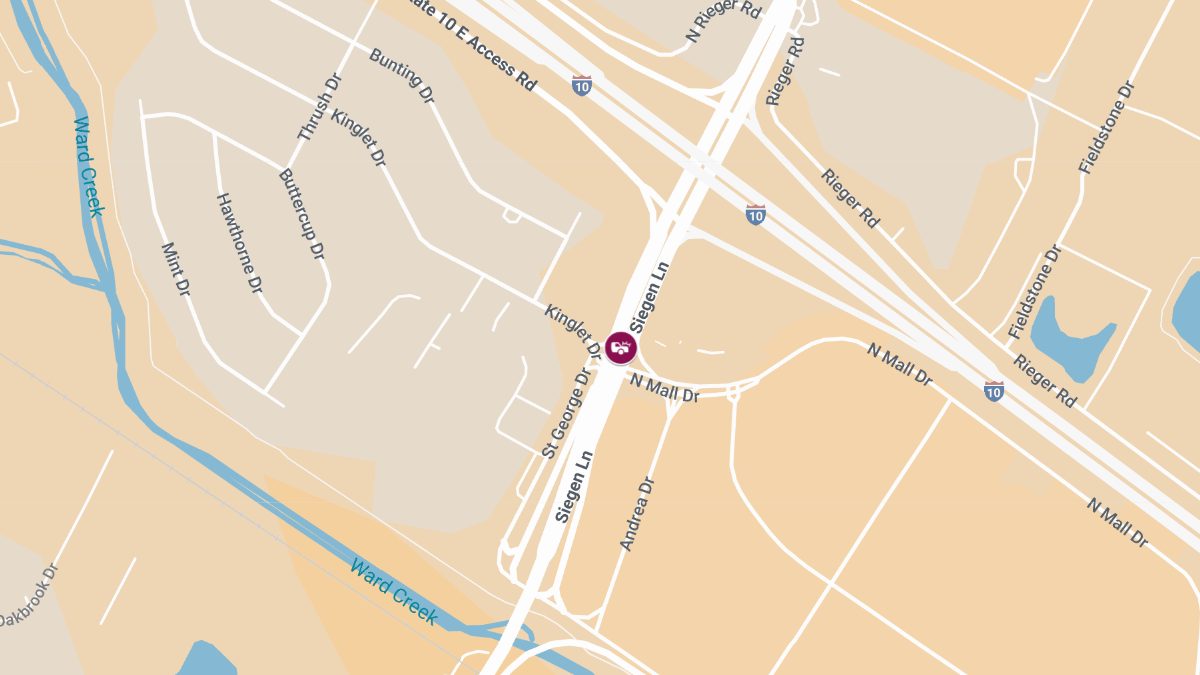 Woman Suffers Back Pain After Parking Lot Crash on Siegen Ln