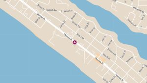 Motorcycle Crash on Thomas Dr Leaves Rider with Leg Injuries