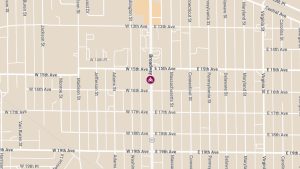 Motorcycle and Vehicle Crash Causes Injury at E 15th Ave & Broadway