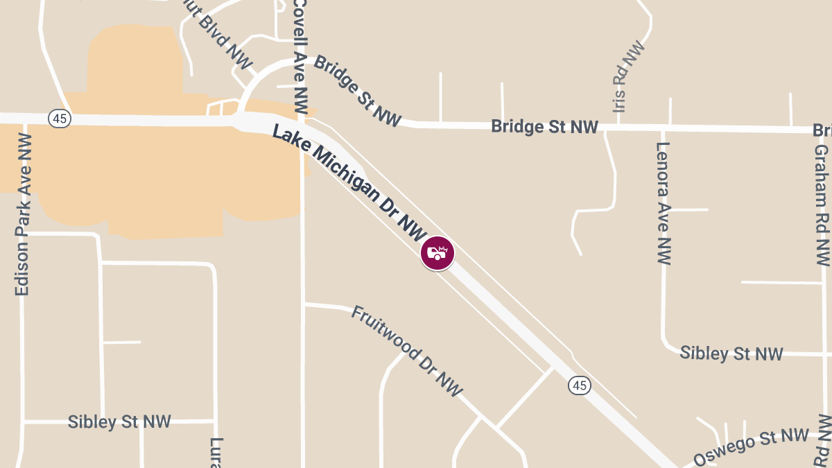 2 Injured, 1 Seriously, After Car Slides Under Semi on Lake Michigan Dr