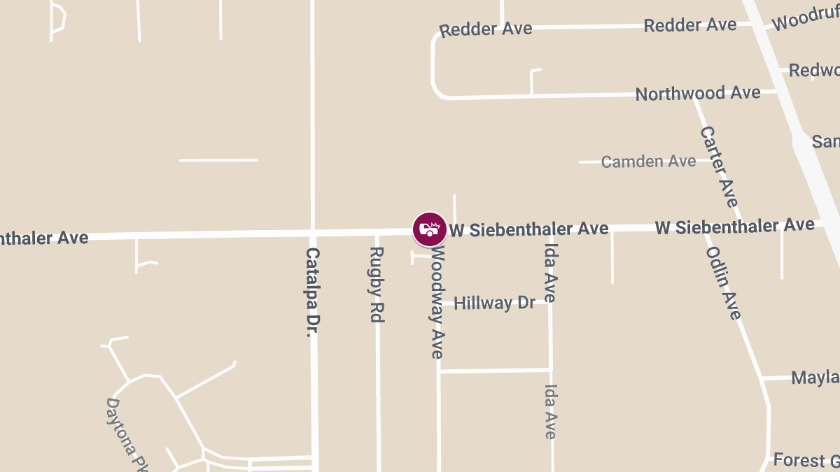 Collision with Injuries Reported on W Siebenthaler Ave Near Credit Union