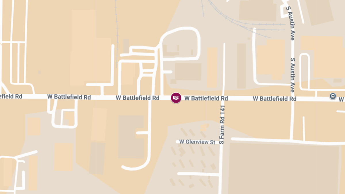 Injury Crash Involving Police Vehicle on W Battlefield Rd