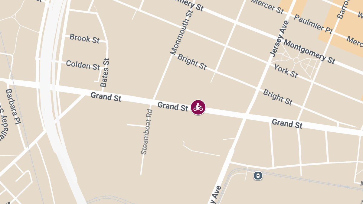Motorcyclist Injured in Crash Near Grand St