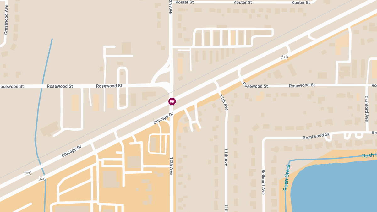 Personal Injury Crash Blocks Westbound Chicago Dr at 12th Ave