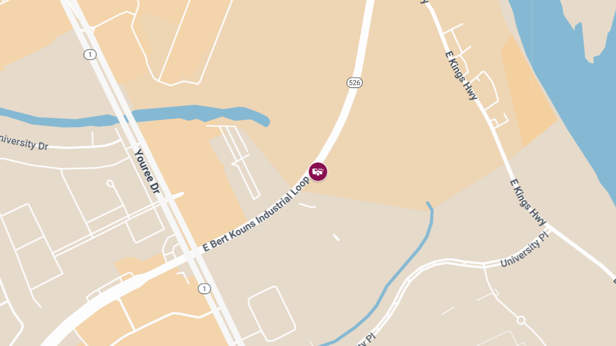 Traffic Collision with Injuries at E Bert Kouns Industrial Loop & University Pl