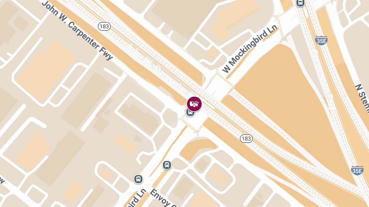 Vehicle Collision With Injuries Reported at John W Carpenter Fwy & W Mockingbird Ln