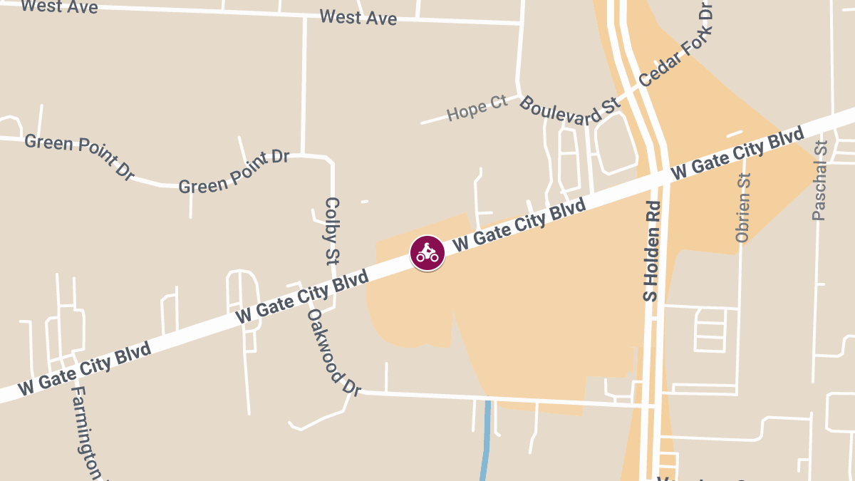 Motorcycle Crash on W Gate City Blvd Leads to Injuries