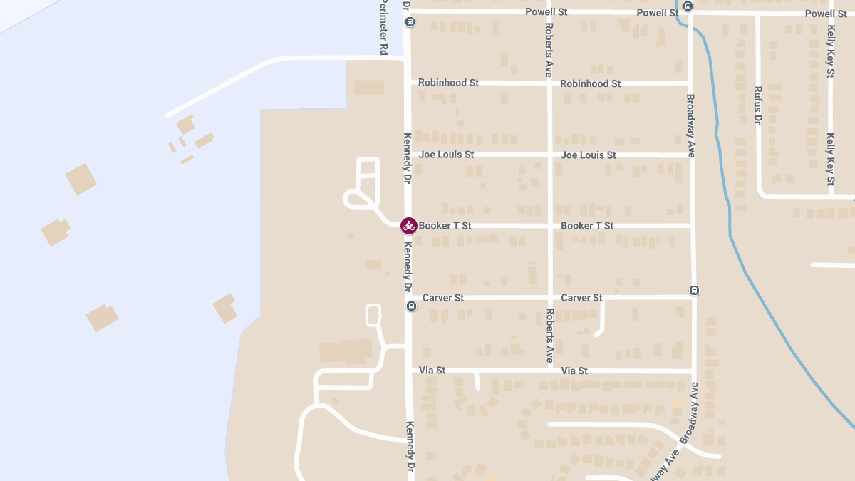 Motorcycle Crash with Leg Injury at Booker T St & Kennedy Dr