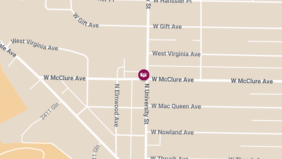 Rollover Crash With Injuries at McClure Ave & University St