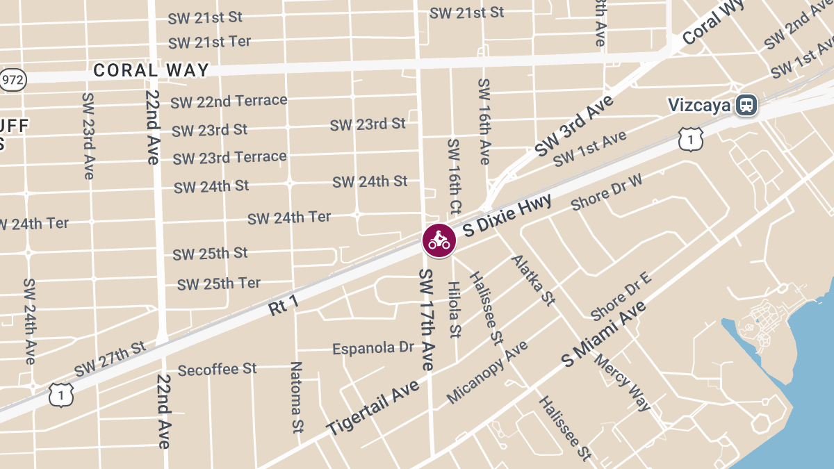 Woman Injured in Car and Motorcycle Crash Near S Dixie Hwy