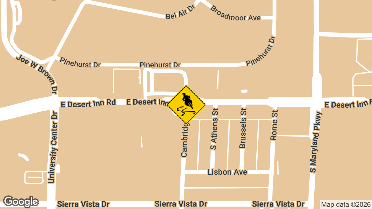 A motorcyclist was hospitalized with life-threatening injuries after a collision involving a vehicle and a motorcycle in central Las Vegas on Thursday morning.