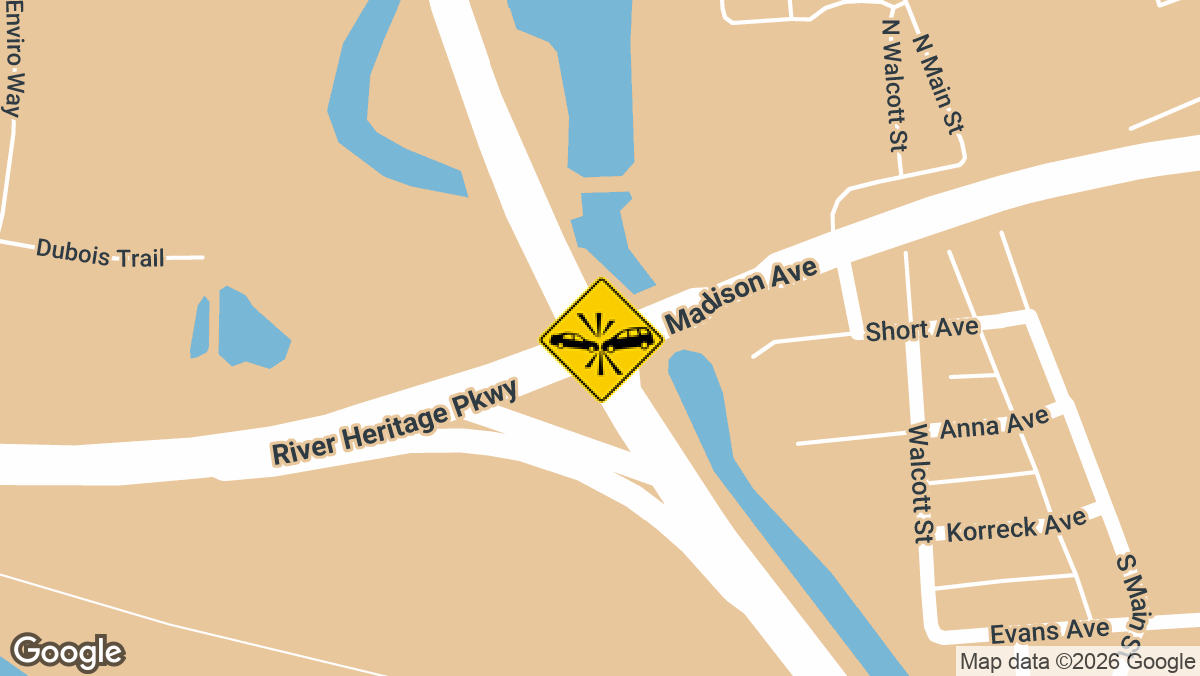 A two-vehicle collision during Tuesday afternoon rush hour overturned a grey SUV and blocked traffic along Lewis and Clark Boulevard near Madison Avenue, close to the Wood River and East Alton border.