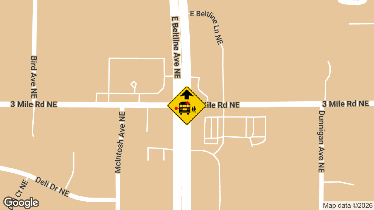 A 39-year-old Grand Rapids woman was hurt after the SUV she was driving ran a red light and struck a school bus at the intersection of E Beltline Ave and 3 Mile Rd on Wednesday, June 3.